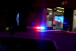 Crime concept - Flashing lights on police car