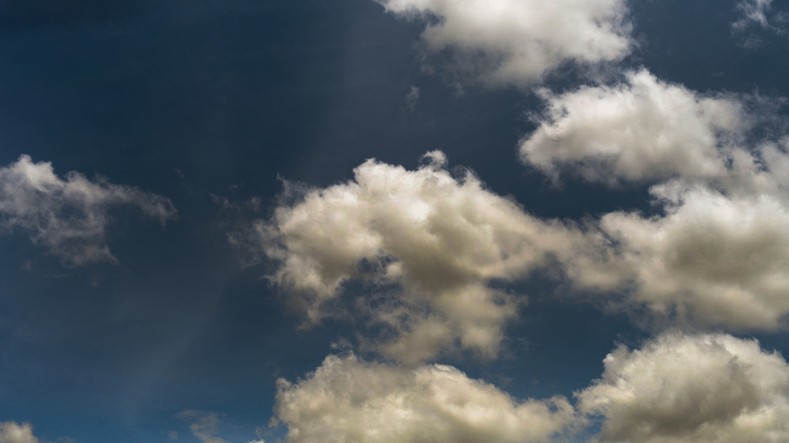 Dark rain cloud dramatic sky summer tropical thunder storm sky and fluffy black darkness cloud nearly raining cloudscape. Dark gray sky cloudy environment. Nimbus raincloud skyline climate background