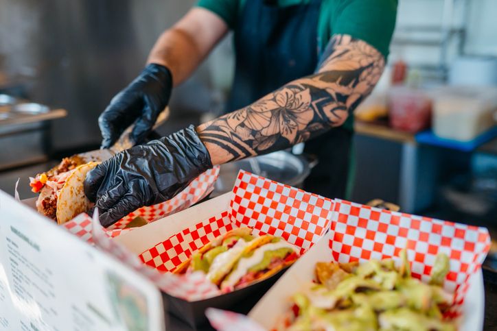 Latino owner in his food truck